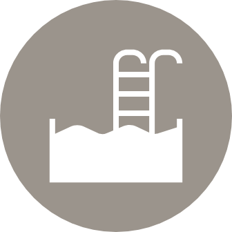 Relax by the zero-edge pool with underwater speakers
